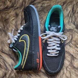 Nike Black Sneakers with Yellow and Orange Highlights